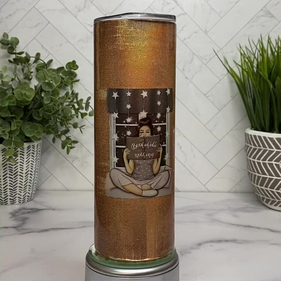 Video of Cup with Rose Gold Background and two book designs